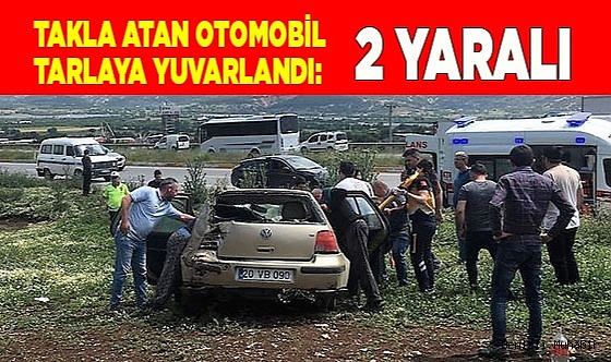 Takla atan otomobil tarlaya yuvarlandı: 2 yaralı