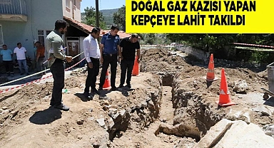 Doğal gaz kazısı yapan kepçenin bıçağına lahit takıldı