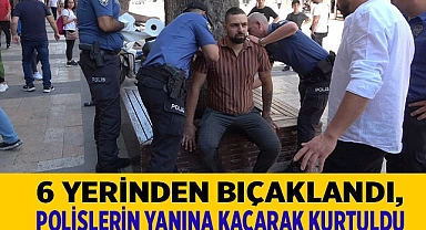 Polislerin yanına kaçarak kurtuldu
