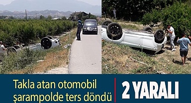 Takla atan otomobil şarampolde ters döndü: 2 yaralı