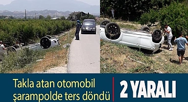 Takla atan otomobil şarampolde ters döndü: 2 yaralı