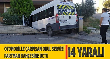 Otomobille çarpışan okul servisi apartman bahçesine uçtu: 14 yaralı