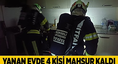 Yanan evde 4 kişi mahsur kaldı