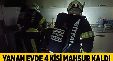 Yanan evde 4 kişi mahsur kaldı