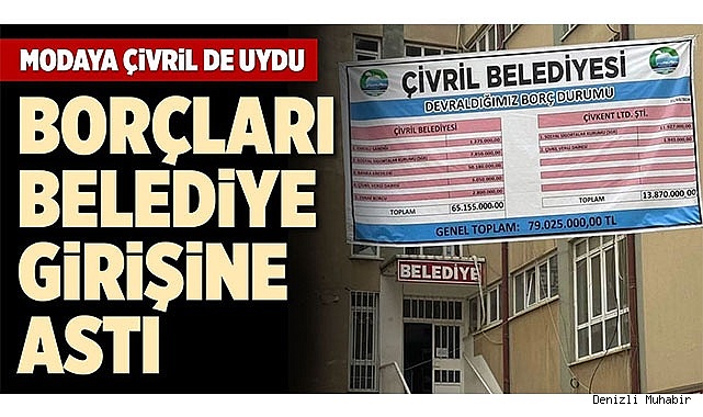 BORÇLARI BELEDİYE GİRİŞİNE ASTI