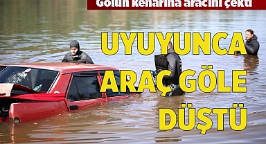 UYUYUNCA ARAÇ GÖLE DÜŞTÜ