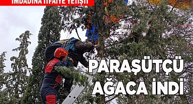 Denizli’de ağaçta asılı kalan yamaç paraşütçüyü itfaiye kurtardı