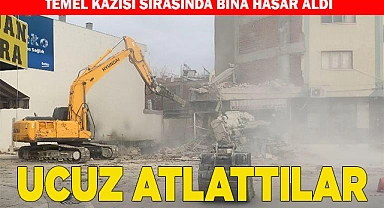 İş makineleriyle desteklenen bina kontrollü olarak yıkıldı