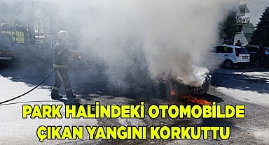 Park halindeki otomobilde çıkan yangını korkuttu