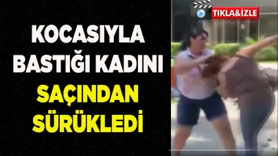 KOCASIYLA BASTIĞI KADINI SAÇINDAN SÜRÜKLEDİ