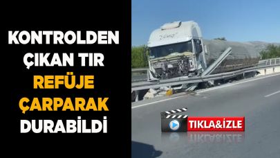 Kontrolden çıkan tır refüje çarparak durabildi