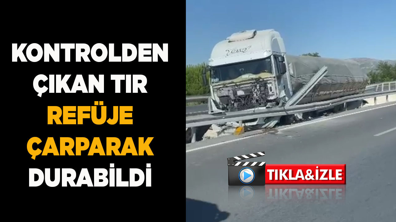 Kontrolden çıkan tır refüje çarparak durabildi